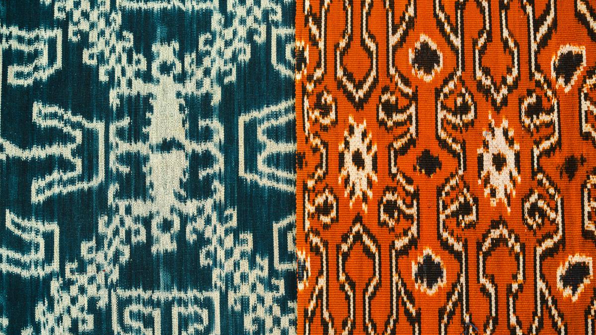 Close-up of sustainable cloth co patterns showing tight microfiber weave and reinforced stitching
