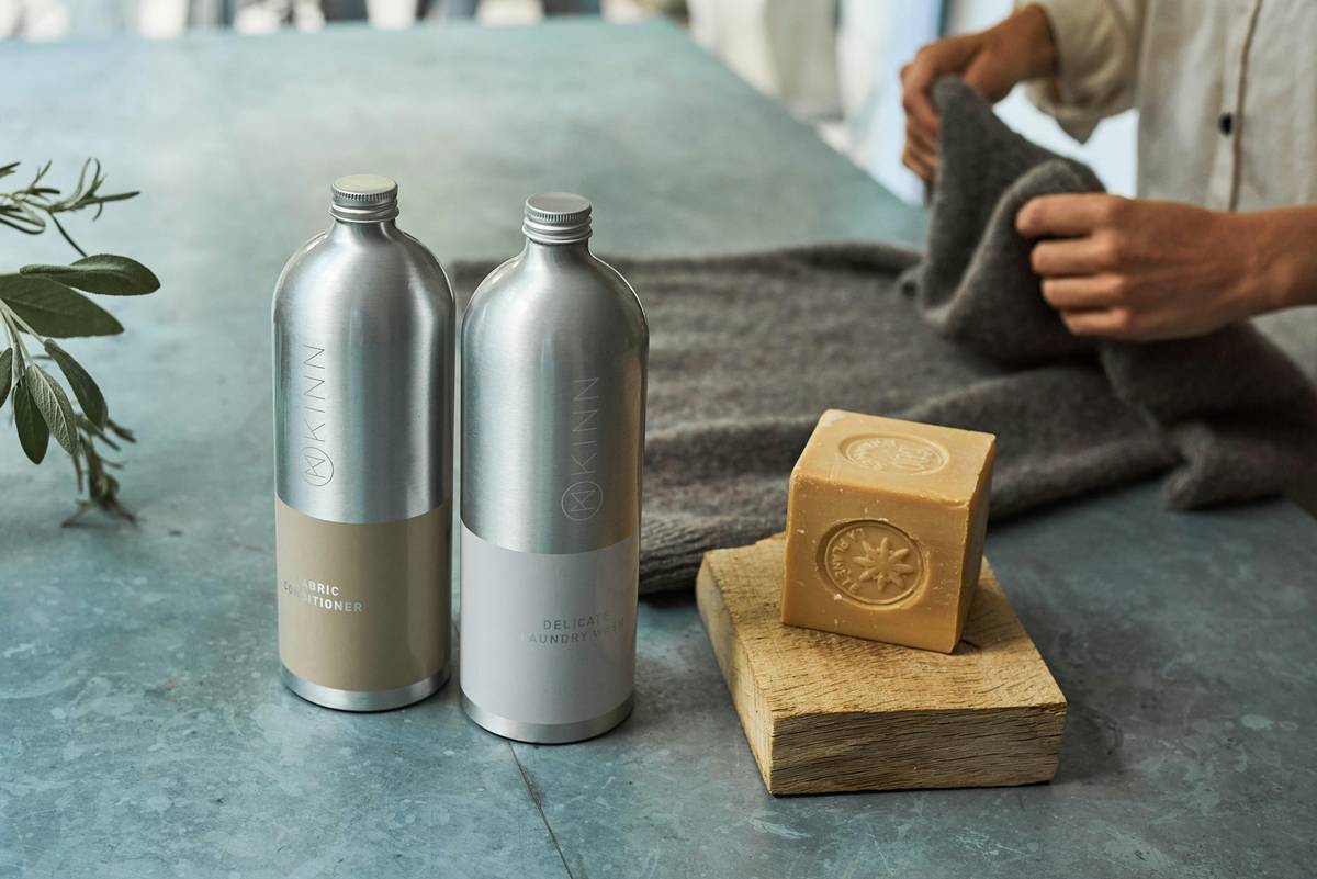 Close-up of sustainable home microfiber cloth which towel wiping a glass surface without streaks